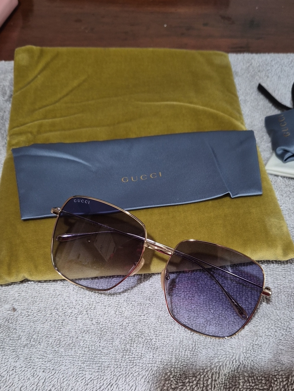 Gucci Women's Gold Frame Sunglasses With kuchi heart charms